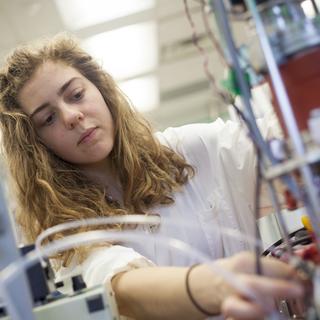AERL student working with the mass spectrometer